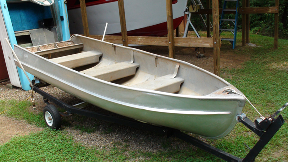  boat out to pasture behind the barn and hung the motor on my big boat